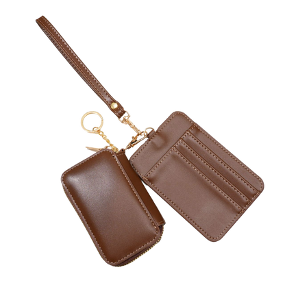 Brown leather wallet with strap and keychain