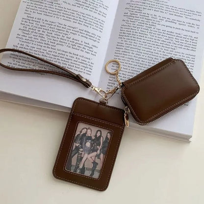 Brown leather wallet with strap and keychain