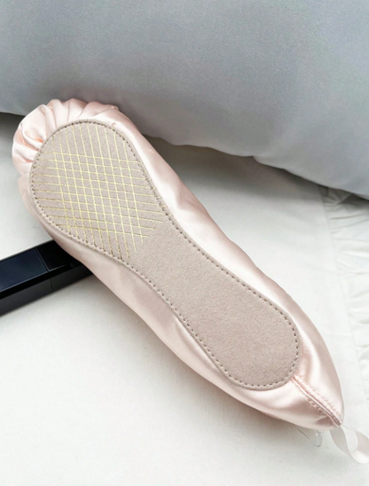 Pink satin pouch with a gold clasp