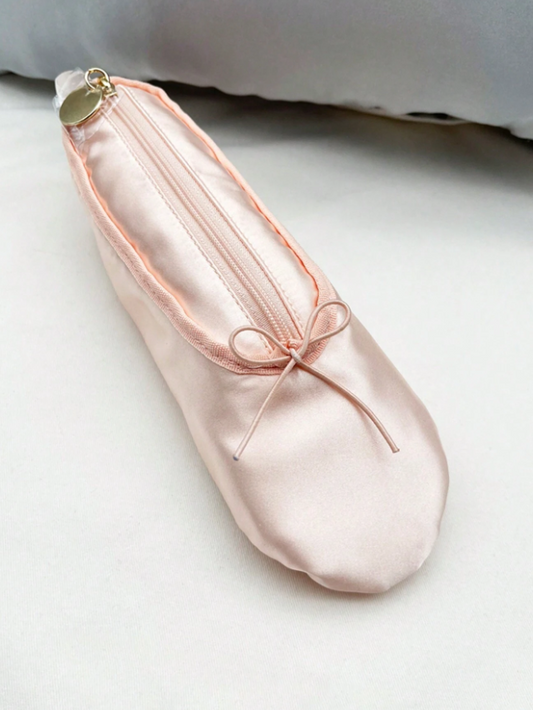 Pink satin pouch with a gold clasp