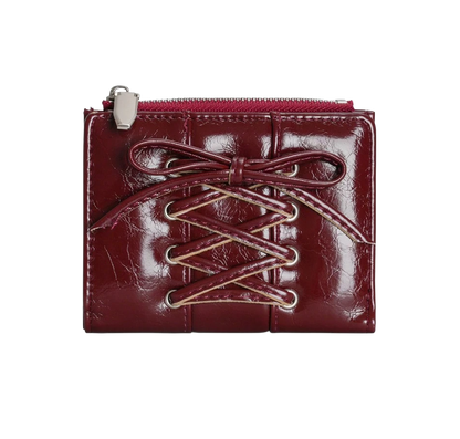 Red leather wallet with lace-up design