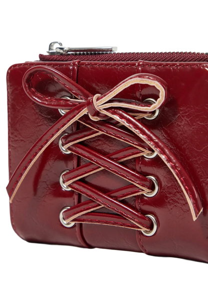 Red leather wallet with lace-up design